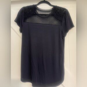 Ann Taylor navy tee with cutout lace type detail. Size S